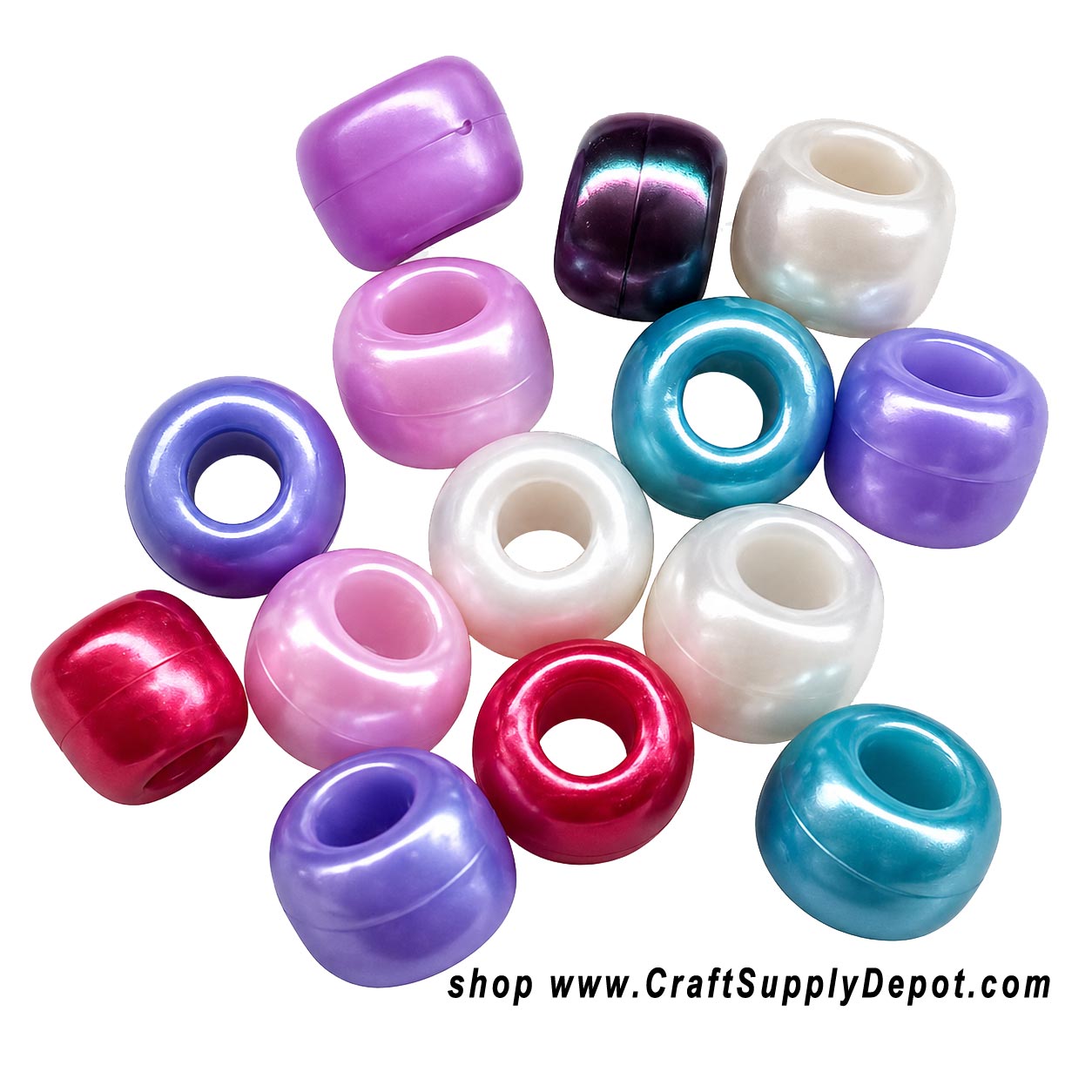 Assortment of glossy pearl pony beads in pink, turquoise, purple, white, red, and black scattered on a transparent background, showing both side and front views to highlight the beads' pearlescent finish and large stringing holes.