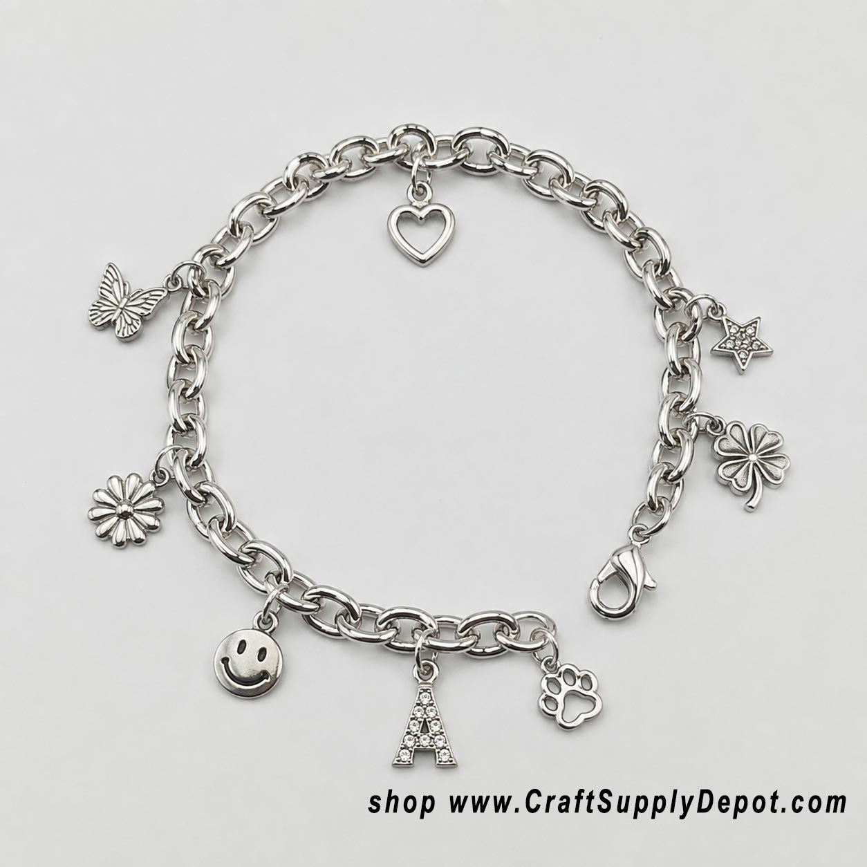 Bright silver-tone empty charm bracelet blank with lobster clasp for adding charms, beads and dangles, personalized jewelry making supply for sale