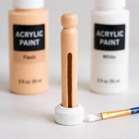 Painted wooden doll pin set for making and displaying handcrafted doll pin dolls.