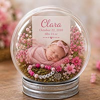 Personalized newborn baby fillable ornament keepsake featuring baby's photo, birth statistics, flowers, and nursery d�cor ideas.