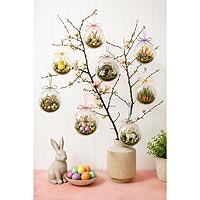 Easter tree decorating idea featuring fillable ornaments and spring miniatures for Easter and seasonal home d�cor.