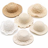 Assorted miniature ladies hats for doll making, including a woven straw hat, natural abaca hat, crocheted hats, and fabric hats, shown undecorated on a white background for customizing handmade dolls and doll crafts.